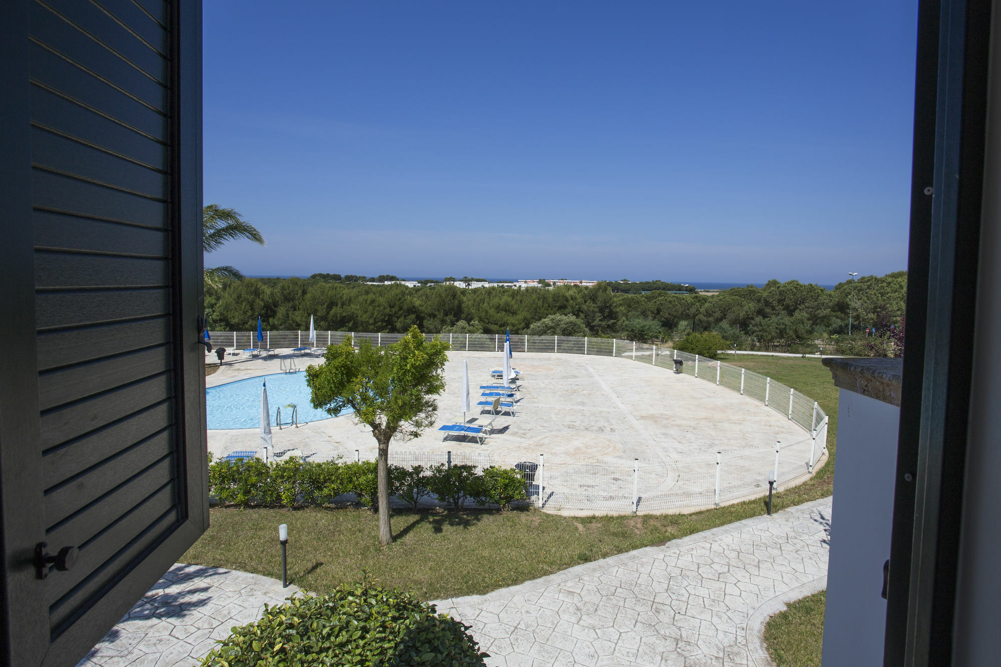 Hotel Resort Portoselvaggio Sant Isidoro  Exterior photo